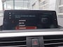 BMW 1-Serie 120i High Executive | Navigatie/Carplay | LM Velgen 18" | Voorstoelen Verwarmd | Cruise Control | Lederen Bekleding | Achteruitrijcamera | Airco |