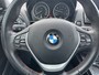 BMW 1-Serie 114i Upgrade Edition Led / Leer / Sportstoelen / Cruise / Navi / Lmv / Airco