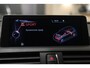 BMW 1-Serie M135i xDrive High Executive M PANO/CARPLAY/LEER/H&K/BOMVOL