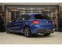BMW 1-Serie M135i xDrive High Executive M PANO/CARPLAY/LEER/H&K/BOMVOL