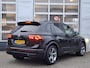 Volkswagen Tiguan 1.5 TSI R-Line Business+ | Navigatie | LM Velgen 29" | Elektrisch Glazen Panoramadak | Voorstoelen/Stuur/Achterbank Verwarmd | Cruise Control Adaptief | Achteruitrijcamera | Airco |