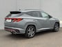 Hyundai Tucson 1.6 T-GDI PHEV N Line Sky 4WD / Afn. Trekhaak ( 1350 ) / Fabrieksgarantie tot 12-2027 / Panoramadak - Schuif&Kanteldak / Dealer Onderhouden / Elektrische stoelen + Memory / Stoel Verwarming & Verkoeling / Stuurwiel Verwarming / 360 Camera / Dodehoek Detectie / Navigatie / Apple Carplay & Android Auto / DAB / Achterbank Verwarming /