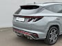 Hyundai Tucson 1.6 T-GDI PHEV N Line Sky 4WD / Afn. Trekhaak ( 1350 ) / Fabrieksgarantie tot 12-2027 / Panoramadak - Schuif&Kanteldak / Dealer Onderhouden / Elektrische stoelen + Memory / Stoel Verwarming & Verkoeling / Stuurwiel Verwarming / 360 Camera / Dodehoek Detectie / Navigatie / Apple Carplay & Android Auto / DAB / Achterbank Verwarming /