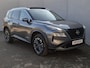 Nissan X-Trail 1.5 e-Power Tekna Automaat / Fabrieksgarantie tot 04-2028<100.000 / All season banden / Head Up Display / Elektrische achterklep / Glazen schuif- en kanteldak / Stuur-, Stoel & Achterbank verwarming / Adaptief cruise control /