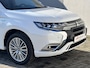 Mitsubishi Outlander 2.4 PHEV Plug-in Instyle Automaat / Afn. Trekhaak / Garantie tot 9-2029 <160.000km / Adap Cruise / Dealer onderhouden / Panorama dak / 1500kg Trekgewicht / Rondomzicht Camera / Apple Carplay Android Auto / Allseason banden / Stuur & Stoelverwarming /