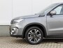 Suzuki Vitara 1.4 Boosterjet Style Hybrid | Schuif/Kanteldak | Leder | Adap. Cruise | Park sens | Lm-Velgen | Trekhaak