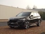 BMW X1 sDrive20i Sportif | All-Black | Uniek | Custom | 19 inch | Nav