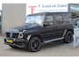 Mercedes-Benz G-klasse 63 AMG Manufaktur/Night pakket/Magno matt/Panoramadak/Burmester/Sfeerverlichting/Entertainment schermen/Akrapović/AMG active ride control/Elektrisch verstelbare stoelen met memory + massage/Stoel verwarming + koeling/360° camera/voorruitverwarming/IWC/Ala