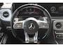 Mercedes-Benz G-klasse 63 AMG Manufaktur/Night pakket/Magno matt/Panoramadak/Burmester/Sfeerverlichting/Entertainment schermen/Akrapović/AMG active ride control/Elektrisch verstelbare stoelen met memory + massage/Stoel verwarming + koeling/360° camera/voorruitverwarming/IWC/Ala