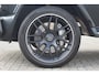 Mercedes-Benz G-klasse 63 AMG Manufaktur/Night pakket/Magno matt/Panoramadak/Burmester/Sfeerverlichting/Entertainment schermen/Akrapović/AMG active ride control/Elektrisch verstelbare stoelen met memory + massage/Stoel verwarming + koeling/360° camera/voorruitverwarming/IWC/Ala
