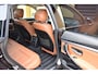 BMW 3-Serie Gran Turismo 320i Centennial High Executive * Panoramadak * Trekhaak * Sportstoelen * Sfeerverlichting *