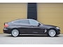 BMW 3-Serie Gran Turismo 320i Centennial High Executive * Panoramadak * Trekhaak * Sportstoelen * Sfeerverlichting *