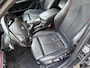 BMW 1-Serie 114i Business+ / SPORT / LEER / SCHUIFDAK / NAVI / STOELVERWARMING