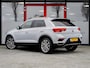 Volkswagen T-Roc 2.0 TSI 4Motion Sport | Navigatie | Stoelverwarming | Parelmoer Lak | Adaptieve Cruise Control | Apple Carplay | Android Auto | 18'' Lichtmetalen Velgen | LED Koplampen | Climate Control | Elektrische Kofferklep |