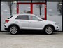Volkswagen T-Roc 2.0 TSI 4Motion Sport | Navigatie | Stoelverwarming | Parelmoer Lak | Adaptieve Cruise Control | Apple Carplay | Android Auto | 18'' Lichtmetalen Velgen | LED Koplampen | Climate Control | Elektrische Kofferklep |