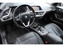 BMW 1-Serie 118i High Executive | Incl. 12 maanden Garantie | 1e Eigenaar | Panorama dak | Stoelverwarming | Trekhaak | Parkeersensoren V+A | Climate controle | Navigatie | Cruise controle | Lederen bekleding | Keyless start | Apple CarPlay/Android Auto | Winterset met LMV |
