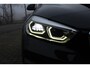 BMW 1-Serie 118i High Executive | Incl. 12 maanden Garantie | 1e Eigenaar | Panorama dak | Stoelverwarming | Trekhaak | Parkeersensoren V+A | Climate controle | Navigatie | Cruise controle | Lederen bekleding | Keyless start | Apple CarPlay/Android Auto | Winterset met LMV |