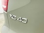 Volvo XC40 T4 Recharge Plus Dark | 19" | Harman Kardon | Elektrisch verstelbare stoelen | Stoel/Stuurverwarming | Getint Glas | Parkeerverwarming | Parkeercamera |  Keyless | Elektrische achterklep