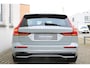 Volvo V60 T6 Plug-in hybrid AWD Plus Dark | Trekhaak | Rondomzicht camera | Verwarmbare voorstoelen + achterbank | Premium audio by Harman Kardon | Verwarmbaar stuurwiel + voorruit | Elek. bed. voorstoelen met geheugen | Blind spot | Elektrische achterklep | Keyless | Adaptive cruise control | Pilot assist |