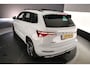 Skoda Karoq Sportline Business 1.5 TSI 150pk DSG Automaat Trekhaak, Panoramadak, CANTON audio, Adaptive cruise control, Elektrische achterklep, LED matrix koplampen