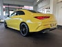 Mercedes-Benz CLA 220 Premium Plus AMG | Panoramadak | Sfeerverlichting | Cruise control | Climate control | Achteruitrijcamera | Stoelverwarming | Lane assist | Elek. inklapbare spiegels | Adaptief onderstel | Navigatie | Lederen/Alcantara bekleding