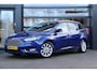 Ford Focus Wagon 1.0 Titanium | Cruise | Clima | Stoel/Stuur Verwarming | Navi | Sensoren | Trekhaak |