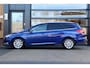 Ford Focus Wagon 1.0 Titanium | Cruise | Clima | Stoel/Stuur Verwarming | Navi | Sensoren | Trekhaak |