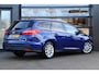 Ford Focus Wagon 1.0 Titanium | Cruise | Clima | Stoel/Stuur Verwarming | Navi | Sensoren | Trekhaak |
