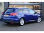 Ford Focus Wagon 1.0 Titanium | Cruise | Clima | Stoel/Stuur Verwarming | Navi | Sensoren | Trekhaak |