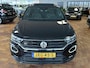 Volkswagen T-Roc 2.0 TSI 4Motion Sport Business R | BEATS Audio | Schuif/ Kantel Panorama Dak | Stoelverwarming | Camera | Stuurwiel Verwarmd | 19'' Suzuka Velgen | Camera | Climate Control | Adaptieve Cruise Control | LED Koplampen |