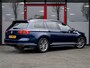 Volkswagen Passat Variant 1.4 TSI Highline Business R | Schuif/ Kantel Panorama Dak | Lederen Bekleding | 3x R-Line | Matrix LED | Adaptieve Cruise Control | Keyless Entry | Stoelverwarming | Voorruit Verwarmd | Sfeerverlichting | Metallic Lak |
