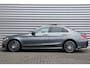 Mercedes-Benz C-klasse C180 156PK AMG LINE PREMIUM PLUS UPGRADE AUTOMAAT / NAVI / LEDER / CLIMA / FULL-LED / PDC / 19" LMV / PANO. DAK / BLUETOOTH / CRUISECONTROL / NIEUWSTAAT !!