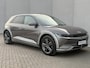 Hyundai Ioniq 5 Lounge 73kWh Automaat / Afn. Trekhaak / Dealer onderhouden / Fabrieksgarantie tot 6-2027 / Warmtepomp / 8 Jaar Batterij Garantie / HUD / CCS snel laden / 360 Camera / Adaptieve Cruise / Lederen Bekleding / Elektr. Stoelen / Stoel Verwarming / Stoel Ventilatie / Stuurwiel Verwarming / BOSE /  Apple Carplay & Android Auto /