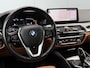 BMW 5-Serie Touring 530e Business Edition Plus SOH 91%/Trekhaak/Leer/Laser.