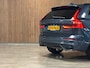 Volvo XC60 T8 AWD Recharge Ultra Dark | Luchtvering | Trekhaak | 360 Camera | Head-Up Display | 455pk | Harman Kardon | Adaptieve Cruise Control | Stoelverwarming voor+achter | Stuurwielverwarming | Schuifdak | 21 Inch | Full LED Meesturende koplampen | Pilot Assist | BLIS Dode Hoek Detectie | Elektrische voorstoelen geheugen | Lederen bekleding | Zitting verlenging voorstoelen | Lederen dashboard | Google Infotainment | Keyless Drive | Parkeersensoren voor+achter | Privacy Glass | Elektrisch bedienbare achterklep | DAB Radio | Apple Carplay/Android Auto | Alarm Klasse III | Draadloos telefoon opladen | Volvo On Call met mobiele App functie | Denim Blue Metallic |