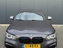 BMW 1-Serie M140i xDrive High Executive Oh Historie - Leder - Apple CarPlay
