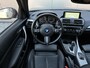 BMW 1-Serie M140i xDrive High Executive Oh Historie - Leder - Apple CarPlay