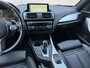 BMW 1-Serie M140i xDrive High Executive Oh Historie - Leder - Apple CarPlay
