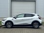 Renault Captur 1.6 E-Tech Plug-in Hybrid 160 Initiale Paris / Lederen Bekleding / Achteruitrijcamera / Stoel & Stuurverwarming / Trekhaak / Apple Carplay & Android Auto / Cruise Control / Climate Control / Parkeersensoren /