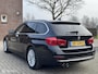 BMW 3-Serie Touring 320i High Executive Leder Sport Navi Prof Automaat