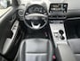 Hyundai Kona Electric EV Premium 64 kWh | SCHUIFKANTELDAK | LEDEREN BEKLEDING | HEAD UP DISPLAY | ADAPTIEVE CRUISECONTROL | GEÏNTEGREERDE NAVIGATIESYSTEEM | MULTIMEDIA APPLE CARPLAY & ANDROID AUTO |