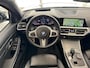BMW 3-Serie Touring 330i High Executive Edition M-Sport | Individual Citrinschwarz | Apple Carplay/Android Auto | Panoramadak | Getint glas | Head-up display | M Aerodynamica | Stuurwiel verwarmd |