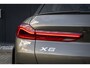 BMW X6 xDrive40i High Executive HUD | H&K | Pano | Luchtvering | 360 Camera | Stuurverwarming | Memory seats | Trekhaak | Adapt. Cruise Control + Zelfsturende functie