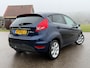 Ford Fiesta 1.25 Titanium / Leder / Stoelverwarming / Clima / 15" Velgen / Trekhaak / PDC / Cruise / A-Z onderhouden /
