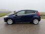 Ford Fiesta 1.25 Titanium / Leder / Stoelverwarming / Clima / 15" Velgen / Trekhaak / PDC / Cruise / A-Z onderhouden /
