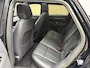 Land Rover Range Rover Evoque 1.5 P300e AWD R-Dynamic SE | Panoramadak | Blackline | Camera | Navigatie | Afneembare trekhaak | Lederen bekleding | Apple CarPlay / Android Auto | Cruise control | Lane assist | Stoel&stuurverwarming | Dodehoekdetectie | 20 inch LMV | LED | DAB | Elektrische achterklep | Volledig onderhouden!