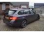 BMW 3-Serie Touring 320i Centennial High Executive Autom Panodak Leder Stoelverw Navi Clima Cruise LED Kopl PDC LMV Trekh ENZ