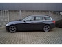 BMW 3-Serie Touring 320i Centennial High Executive Autom Panodak Leder Stoelverw Navi Clima Cruise LED Kopl PDC LMV Trekh ENZ