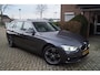 BMW 3-Serie Touring 320i Centennial High Executive Autom Panodak Leder Stoelverw Navi Clima Cruise LED Kopl PDC LMV Trekh ENZ