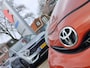Toyota Aygo 1.0 VVT-i DYNAMIC ORANGE Airco | Trekhaak | Lichtmetalen velgen